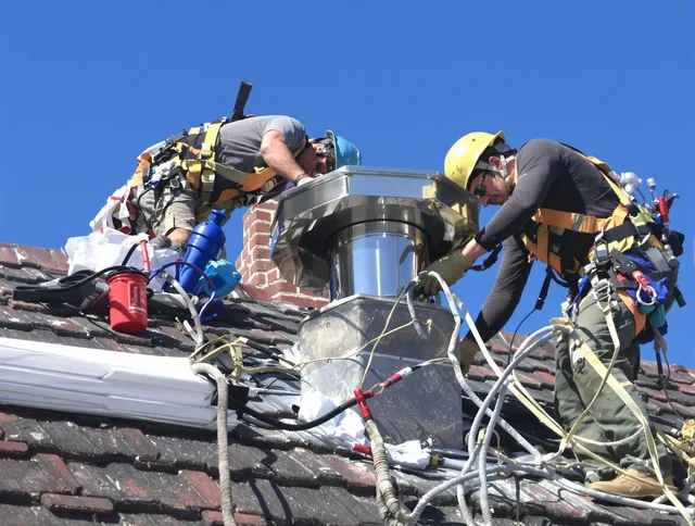 Protective chimney cap installed by South Euclid Chimney Sweep in South Euclid, OH