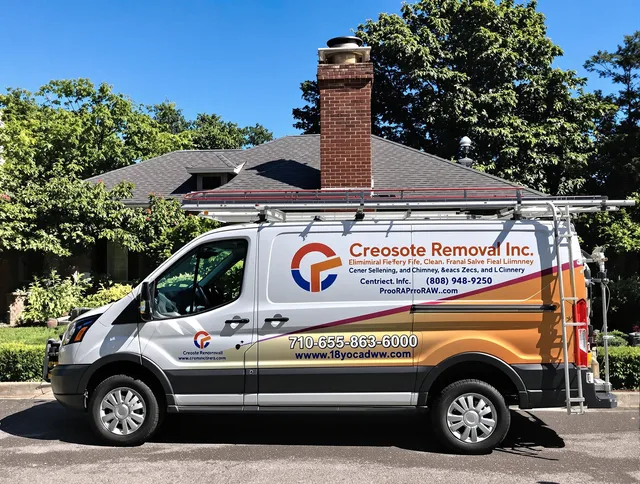South Euclid Chimney Sweep technician removing creosote safely in South Euclid, OH